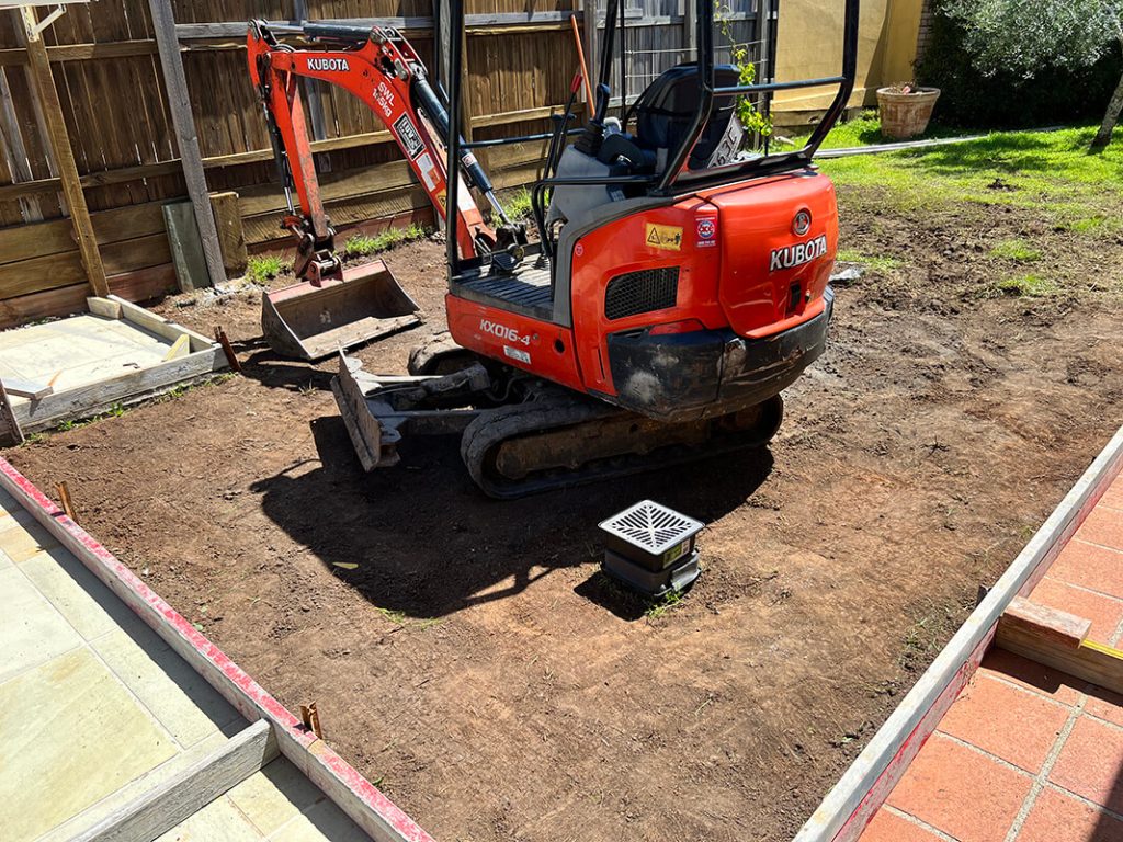 excavate any grass from the work area
